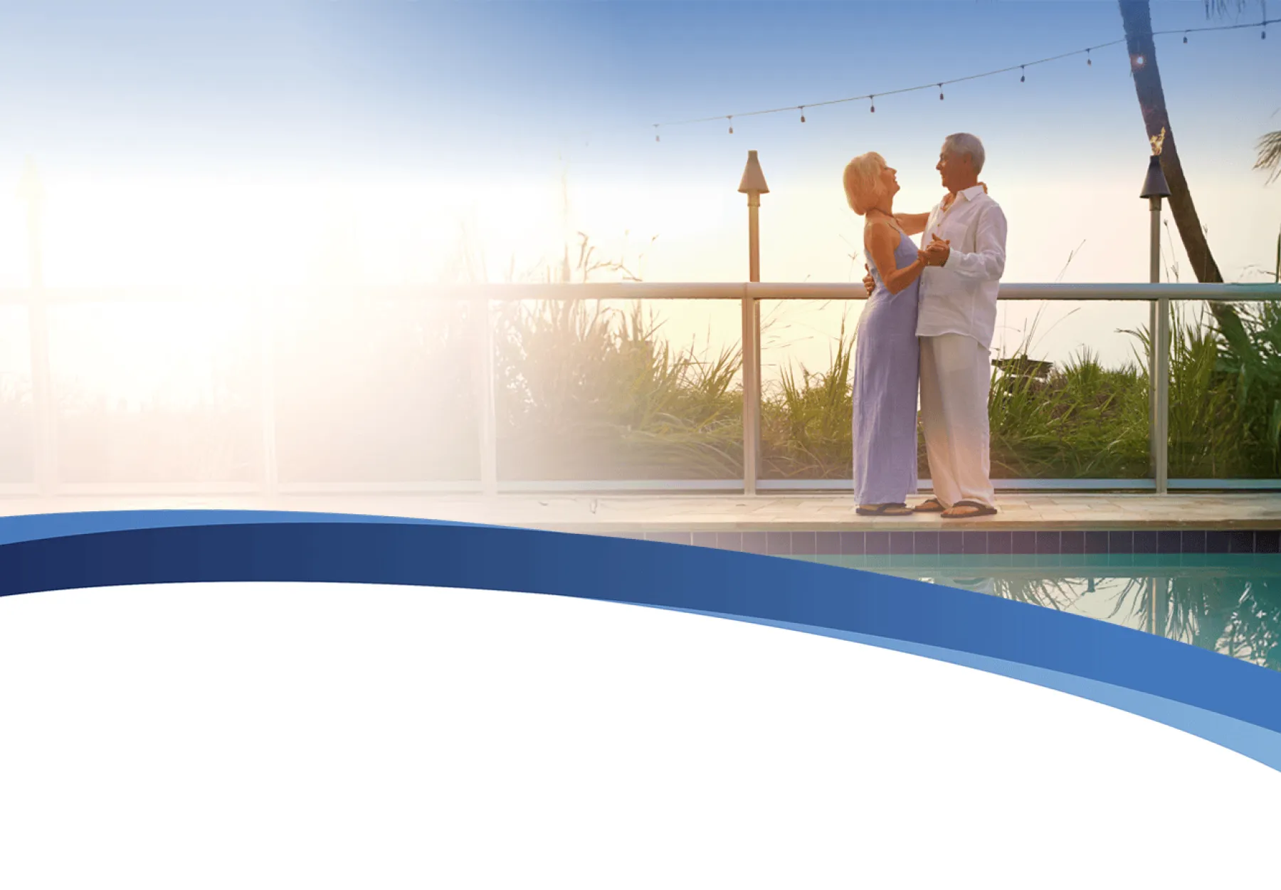 A couple dancing near pool