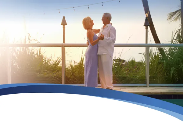 A couple dancing near pool